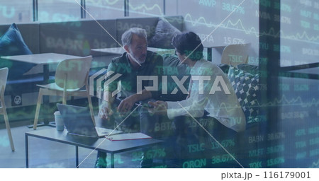 Image of trading board moving over diverse male coworkers discussing plan over laptop in office Image of trading board moving over diverse male coworkers discussing plan over laptop in office 116179001