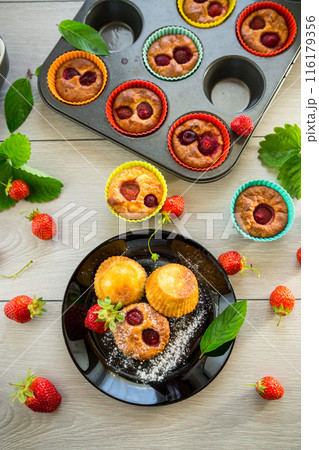 Sweet curd muffins with strawberry filling 116179356