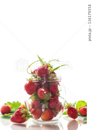 fresh sweet red strawberries in a glass jar 116179358