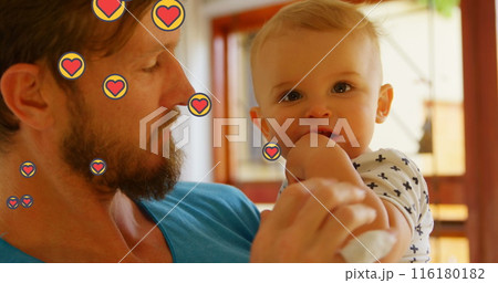 Image of heart icons over caucasian father with baby Image of heart icons over caucasian father with baby 116180182