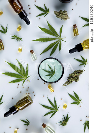 Bottles with hemp oil and cannabis leaves, marijuana  on white background 116180246