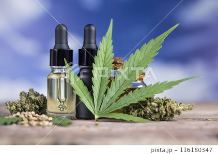 Hemp oil bottle with hemp leaf and cannabis leaf, marijuana 116180347