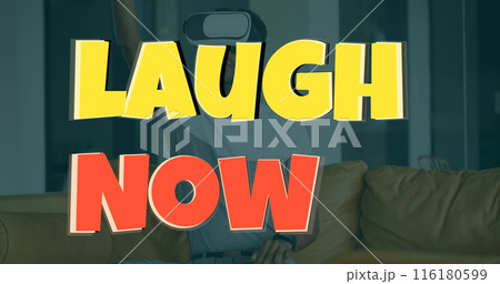 Image of laughs now over caucasian man wearing vr headset 116180599