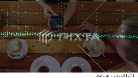 Image of financial data processing with statistics over woman holding payment terminal 116181271