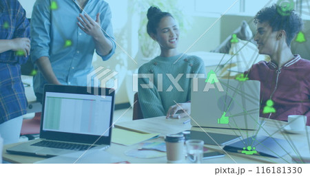 Image of network of connections with icons over diverse business people working at office 116181330