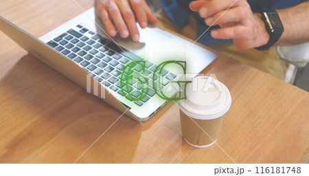 Image of neon 6g text banner against mid section of man using laptop at a cafe 116181748