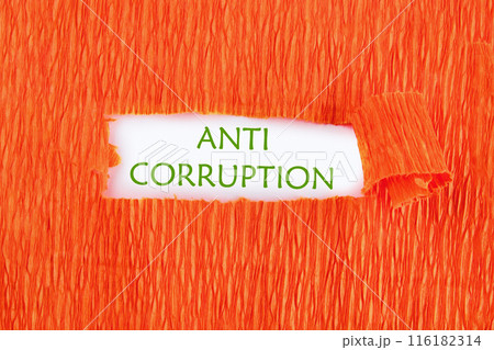 Anti money laundering business and government concept. ANTI CORRUPTION on white under the paper 116182314