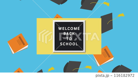 Graduation hat and book icons falling over back to school text on wooden slate on blue background 116182972
