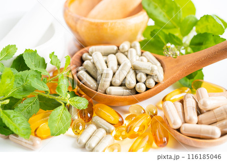 Alternative medicine herbal organic capsule with vitamin E omega 3 fish oil, mineral, drug with herbs leaf natural supplements for healthy good life. 116185046