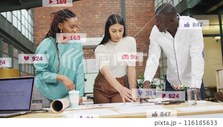 Image of icons and changing numbers in notification bars, diverse coworkers discussing blueprint Image of icons and changing numbers in notification bars, diverse coworkers discussing blueprint 116185633
