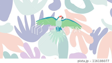 Parrot with vibrant green wings flying over abstract pastel shapes 116186077