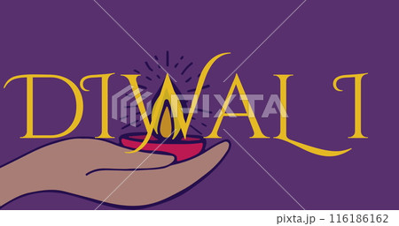 Hand holding lit oil lamp under DIWALI text on purple background 116186162