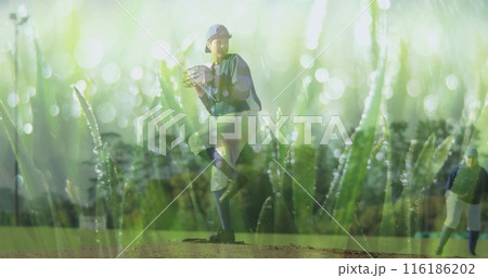 Biracial child in baseball gear stands on pitcher's mound, glove in hand Biracial child in baseball gear stands on pitcher's mound, glove in hand 116186202