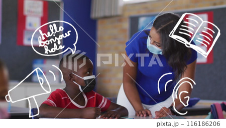 An African American student and biracial teacher, wearing masks, discussing math An African American student and biracial teacher, wearing masks, discussing math 116186206