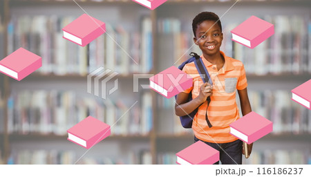 African American child in striped orange shirt, holding backpack, smiles at school African American child in striped orange shirt, holding backpack, smiles at school 116186237