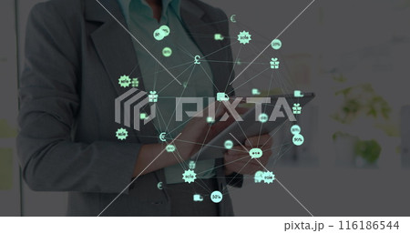 Woman in suit holding tablet, showing network of virus icons 116186544