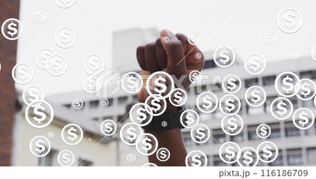 African American girlfriend/wife, wearing smartwatch, raising her fist African American girlfriend/wife, wearing smartwatch, raising her fist 116186709