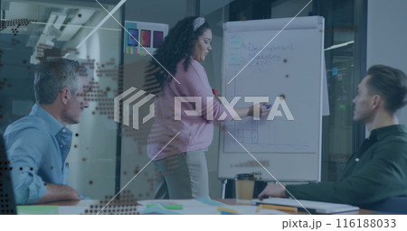 Image of spinning globe and data processing over biracial woman giving a presentation at office Image of spinning globe and data processing over biracial woman giving a presentation at office 116188033
