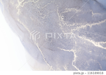 A close-up of a gray marble texture with white veins. The image is abstract and could be used as a background 116189018