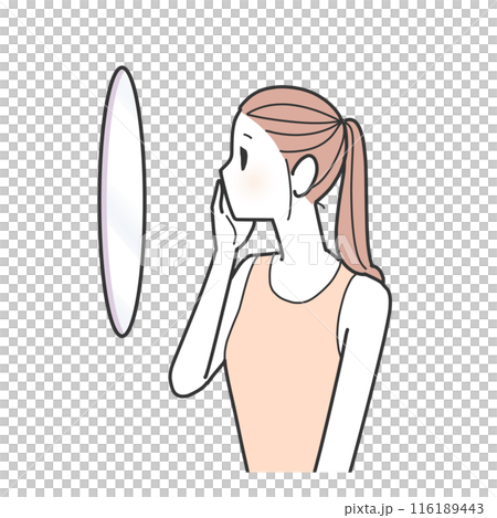 A woman looking at her face in the mirror 116189443