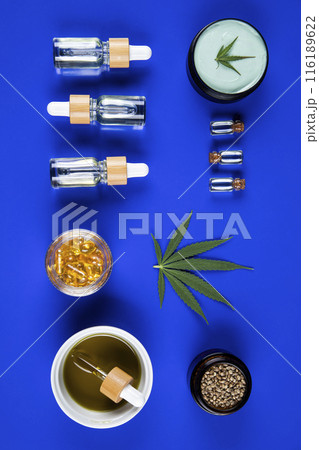 Marijuana leaves, bottle of oil, cannabis on cbd concept 116189622