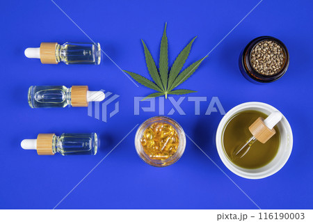 Marijuana leaves, bottle of oil, cannabis on cbd concept 116190003