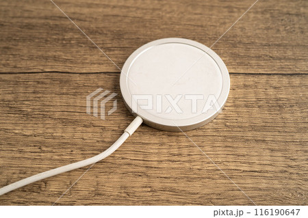 Wireless magnetic charger, modern equipment for mobile phone. Wireless magnetic charger, modern equipment for mobile phone. 116190647