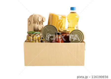 Foodstuff for donation isolated on white background with clipping path, storage and delivery. Various food, pasta, cooking oil and canned food in cardboard box. 116190656