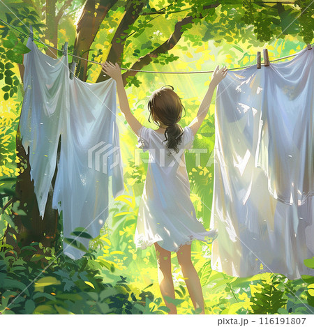 A girl hangs white laundry in nature, in the light of the sun A girl hangs white laundry in nature, in the light of the sun 116191807
