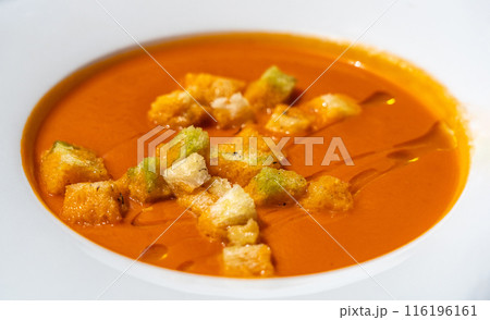 Creamy tomato soup or bisque with croutons, delicious rich smooth texture, perfect healthy lunch 116196161