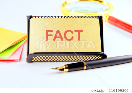 Business concept. FACT word on a gold-colored money card 116199802