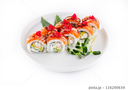 Sushi roll with salmon and tempura shrimp drizzled with unagi sauce and tobiko caviar 116200639