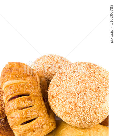 Pastries, buns and bread Isolated on a whit. There is free space for texte. Vertical photo 116200788