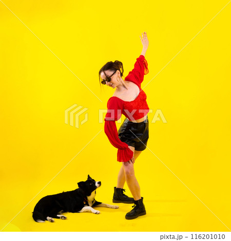 Beautiful sport female with border collie in studio Beautiful sport female with border collie in studio 116201010