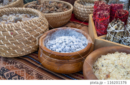 Natural incense sticks, herbal bundles, white resin. Aromatic dried herbs, traditional ritual items 116201376