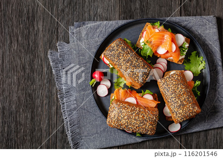 smoked salmon sandwiches on rye bread rolls 116201546