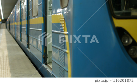Beautiful new metro train at the station. The subway is waiting for passengers. 116201873