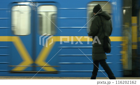 Subway cars arrive at the station. Underground transport. Passenger on the station. 116202162