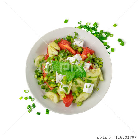 Greek Salad in White Bowl Top View Isolated. Fresh Garden Salat, Greek Salad with Green Onion, Feta Cheese 116202707