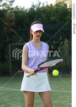 The Warm Up Of A Woman Playing Tennis  116203333