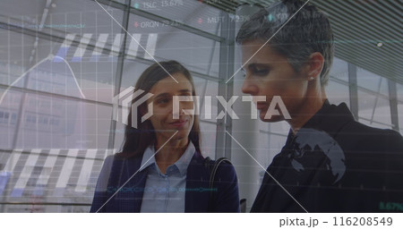 Image of statistical data processing over two diverse businesswoman discussing at office Image of statistical data processing over two diverse businesswoman discussing at office 116208549