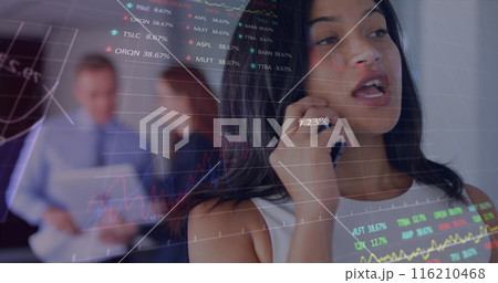 Image of graphs and trading board over beautiful biracial woman talking on smartphone Image of graphs and trading board over beautiful biracial woman talking on smartphone 116210468