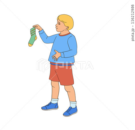 boy holding a sock in his hands	 116212986