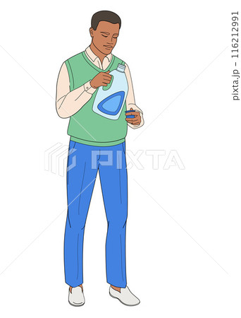 man pouring laundry detergent from bottle into cap man pouring laundry detergent from bottle into cap 116212991