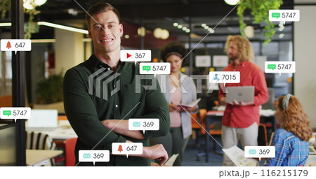 Image of social media data processing over diverse business people in office 116215179