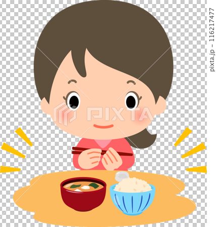 A woman eating brown rice and miso soup 116217477