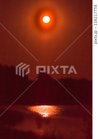 Beautiful red moon in the night sky reflected in the water. Illustration Beautiful red moon in the night sky reflected in the water. Illustration 116217758