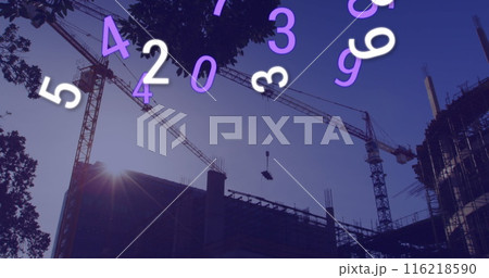 Image of falling numbers over cityscape 116218590