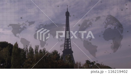 Image of world map and spinning globe against view of eiffel tower 116219402