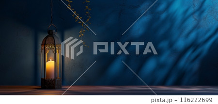 Arabic lanterns Light Lamp with dark blue grungy backdrop. Islamic Ramadan Kareem, iftar festival or Eid Mubarak banner background Arabic lanterns Light Lamp with dark blue grungy backdrop. Islamic Ramadan Kareem, iftar festival or Eid Mubarak banner background 116222699